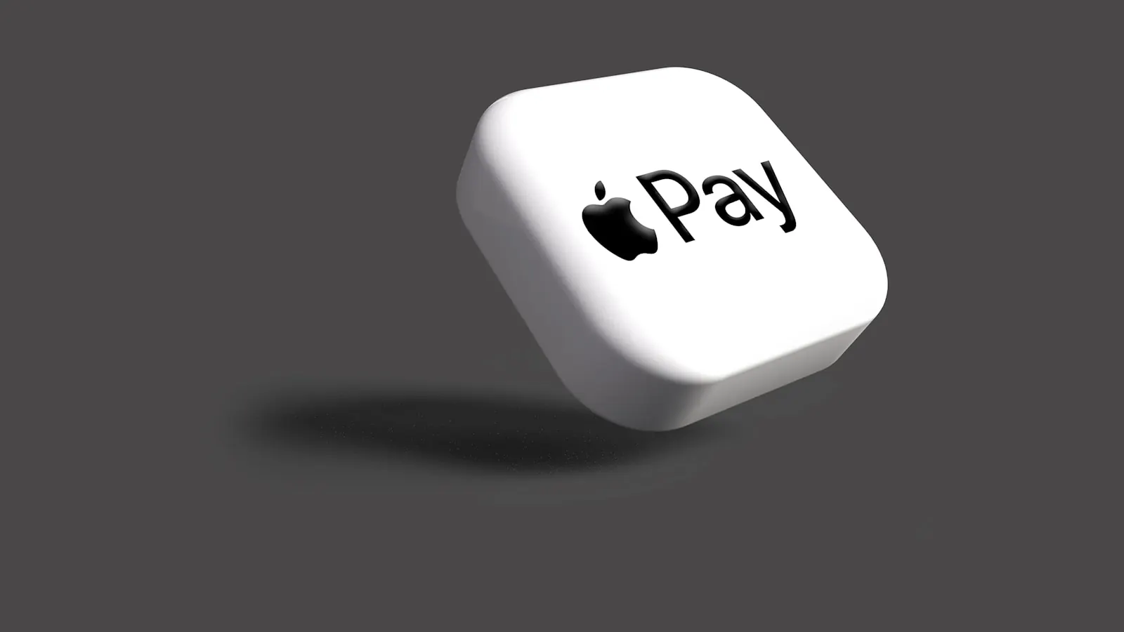 Dé portant l'inscription Pay symbolisant le choix de paiement